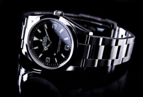 Rolex - silver and black round analog watch