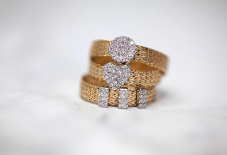 Jewelry - three gold-colored studded rings