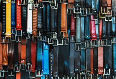 Belts - Shallow Focus Photography of Assorted-color Leather Belts