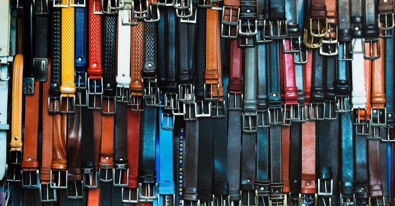 Belts - Shallow Focus Photography of Assorted-color Leather Belts