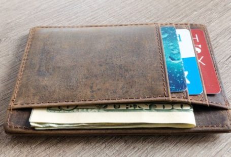 Wallets - Brown Leather Wallet and Us Dollar Banknote